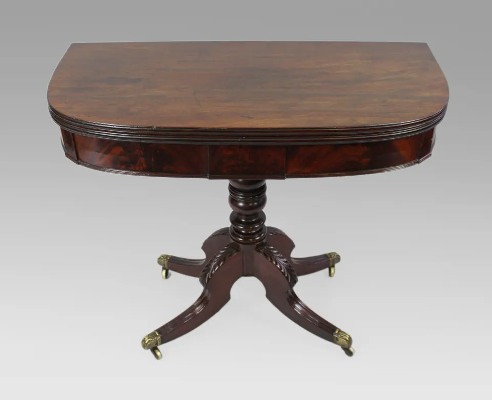 Early 19th Century English Flame Mahogany Fold-Over Tea Table