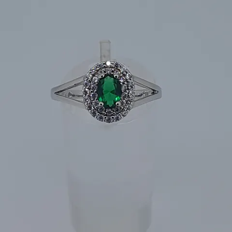 Silver Stamped 925 Dress Ring Set With CZ Stone, Centres Tone Measures 5.94 mm Diameter. Finger Siz