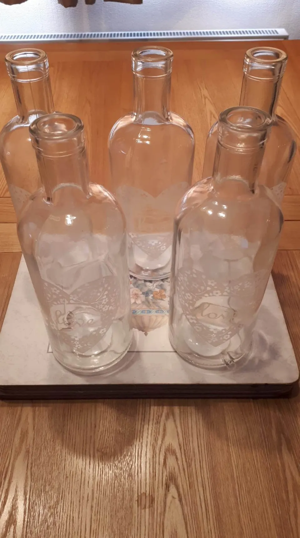 4 boxes of 6 vases with LOVE on them