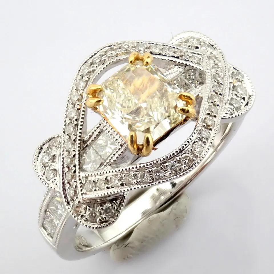 An Exquisite 18K Ring With One Big Fancy Diamond Detailed Brilliant Diamonds Total 1.55 Ct
