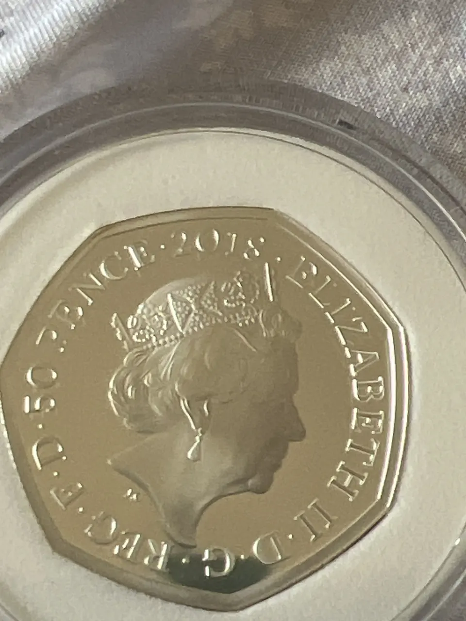 Silver coin depicting flopsy bunny