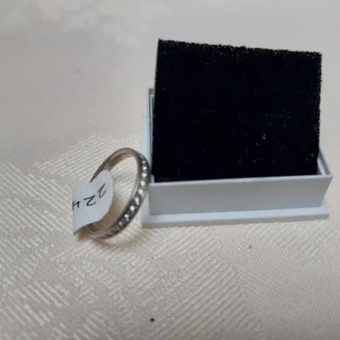 Silver channel set wedding/eternity ring with CZ stones size N.  RRP £179 224