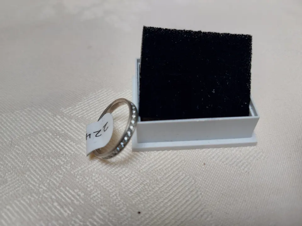 Silver channel set wedding/eternity ring with CZ stones size N.  RRP £179 224