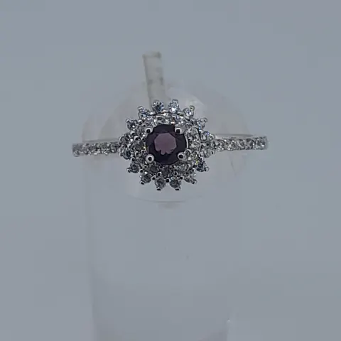 Silver Stamped 925 Dress Ring Set With CZ Stone, Centres Tone Measures 5.94 mm Diameter. Finger Siz