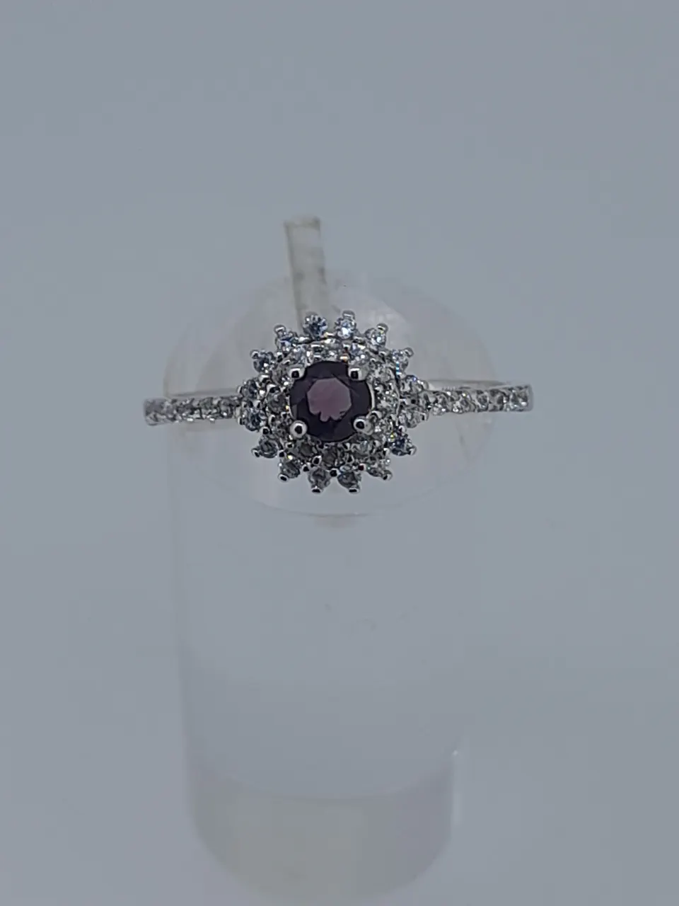 Silver Stamped 925 Dress Ring Set With CZ Stone, Centres Tone Measures 5.94 mm Diameter. Finger Siz