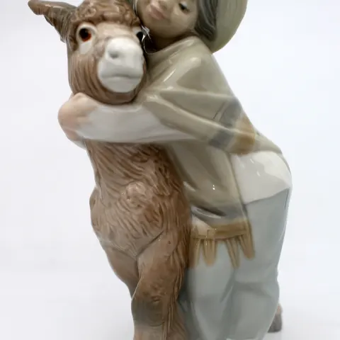 Lladro Boy Hugging Donkey