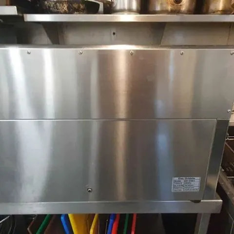 Unused Countertop Gas Powered Griddle Half Ribbed, Half Flat
