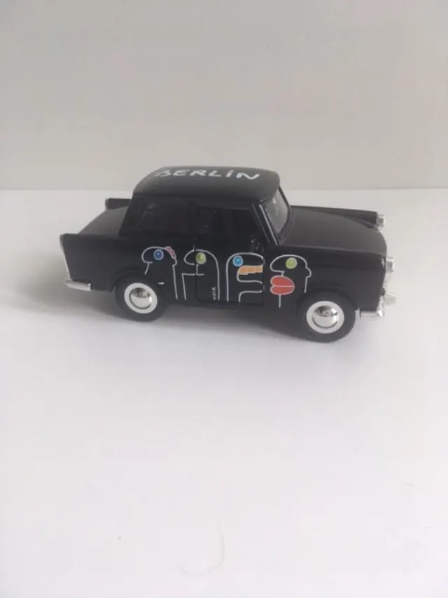 Thierry Noir (b.1958) By Thierry Noir ‘Berlin Trabant in Black with BY Thierry Noir Heads’ 1994