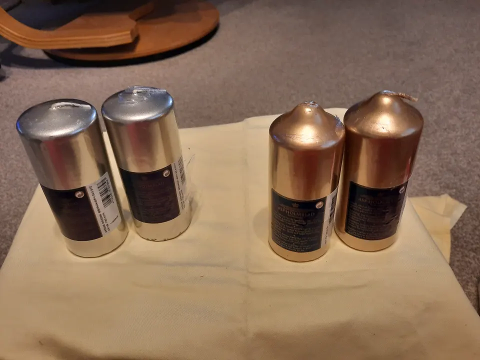 Selection of silver and gold candles