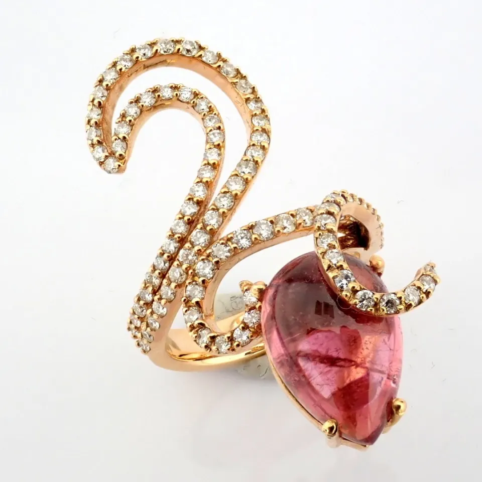 An Exquisite 18K Ring Detailed With 8Ct 'Cab' Tourmaline and 1.23 Ct Diamonds.