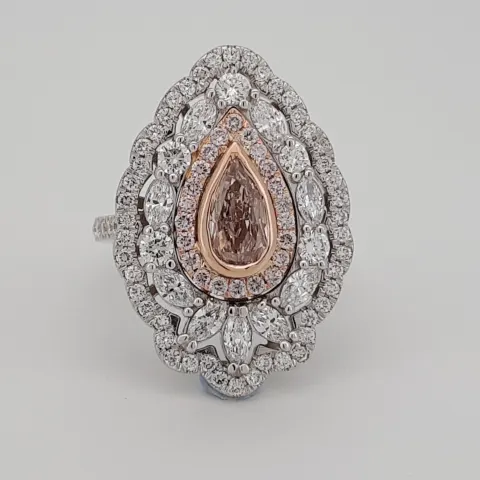 0.77 ct pear shape natural light pink 18k white gold with white coll diamonds2.19 ct