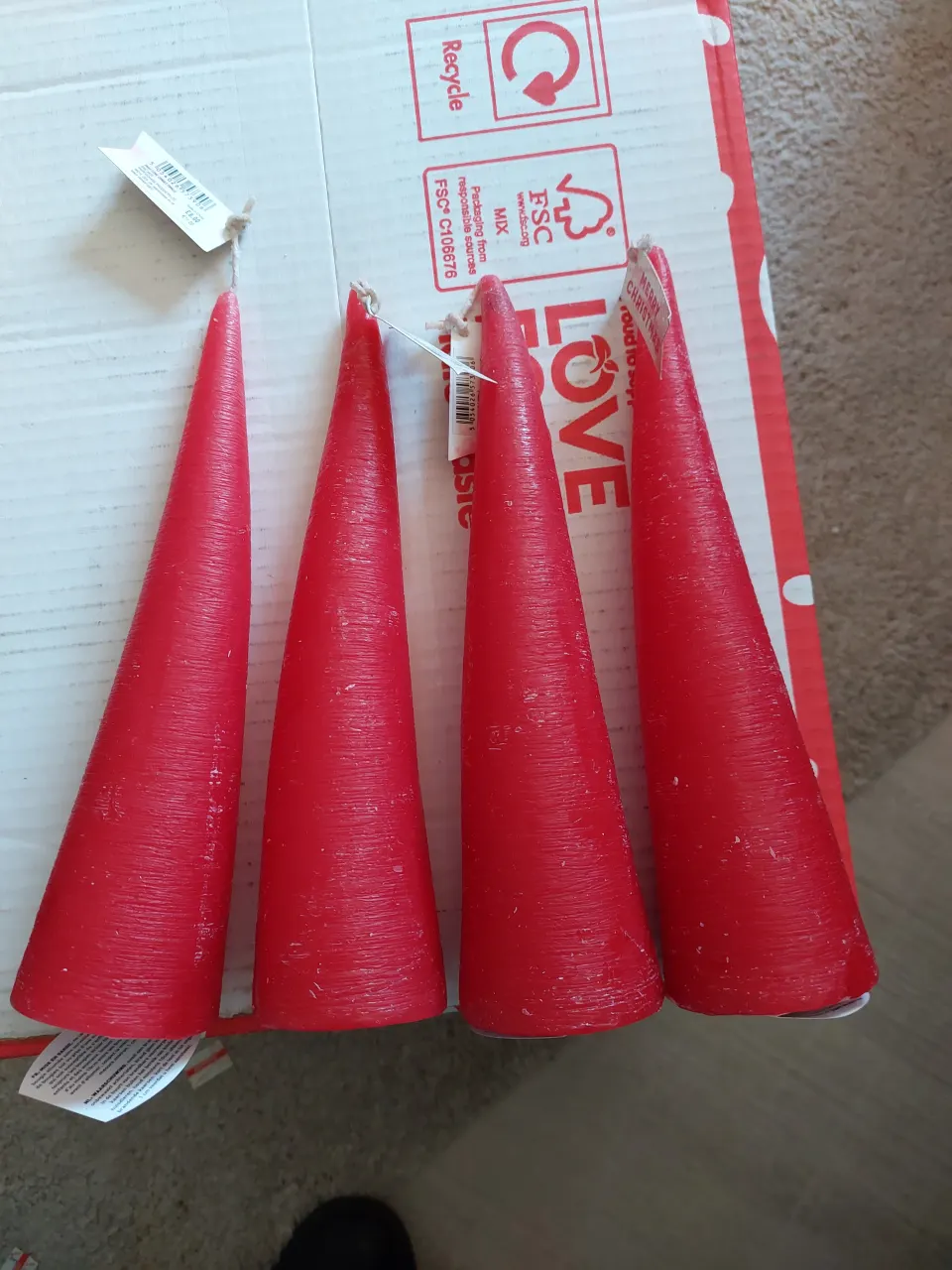 Paperchase tall red cone candles.  Box of 8