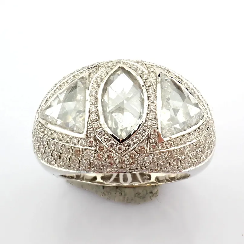 A Luxurious 18K White Gold Ring Detailed With A Slightly Flawed Fancy Cut Diamonds. Total 5.06 Carat