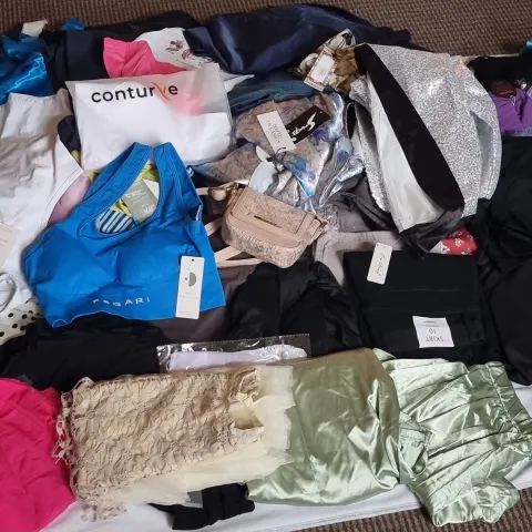 Bundle  of more than 60 brand new clothing