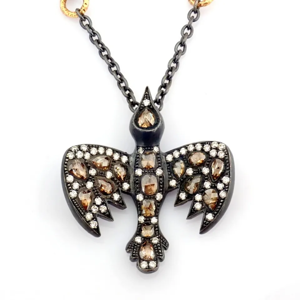 An Exquisite Bird Necklace Detailed With Brilliant Diamonds and Gold On Silver