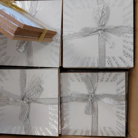 Box of 96 silver and gold edged coasters