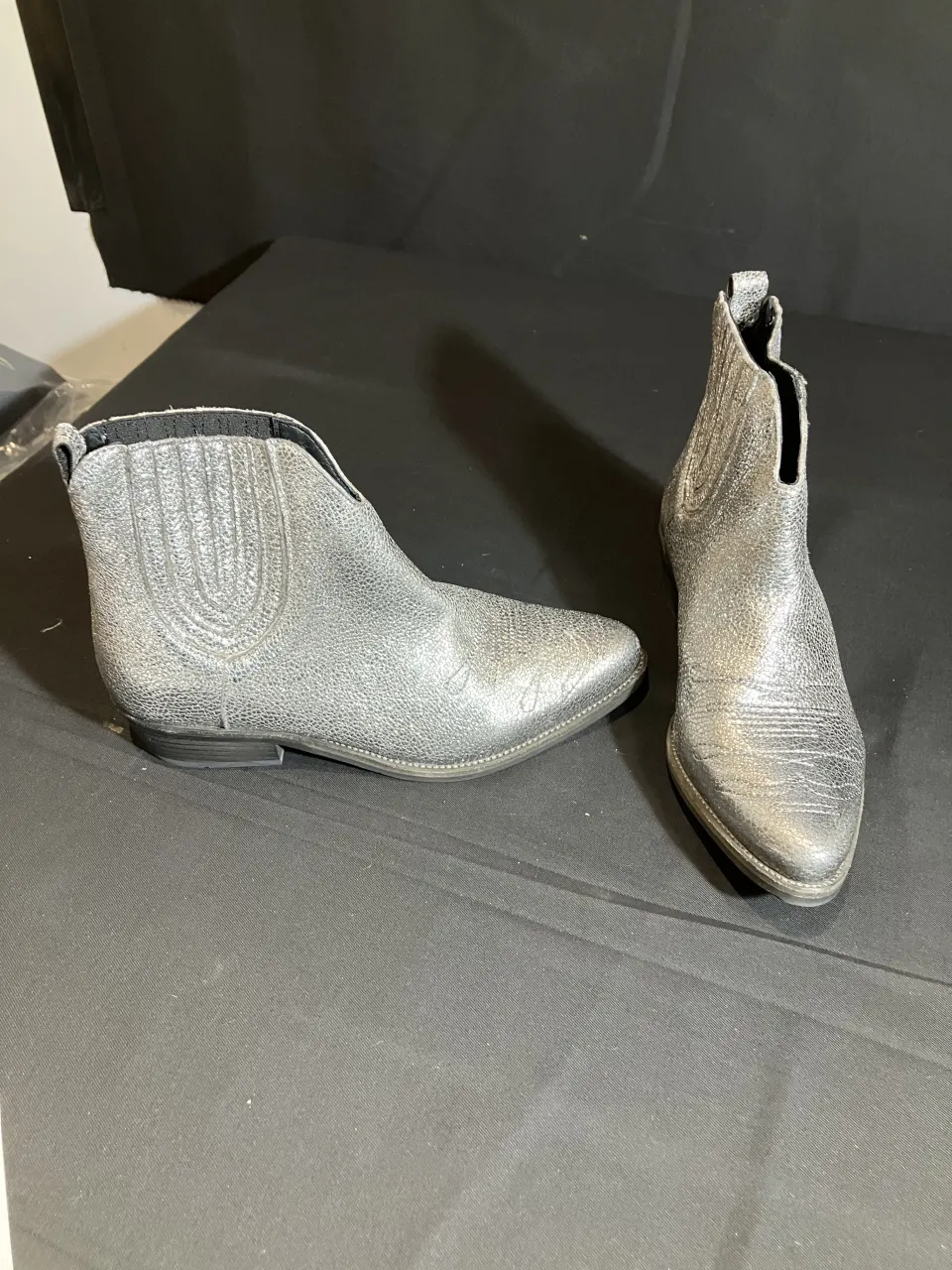 Hush silver boots worn by Mia Lloyd