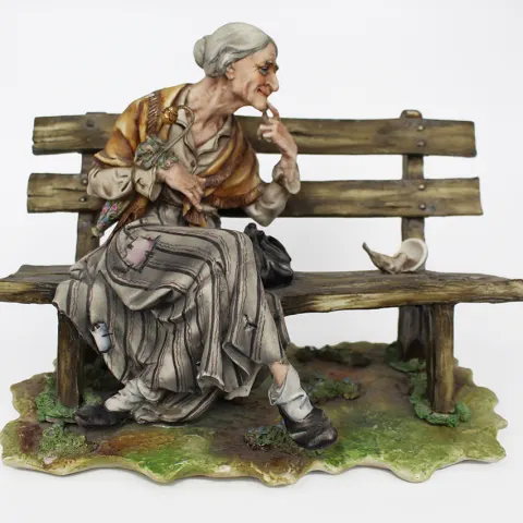 Capodimonte Lady Tramp on Bench
