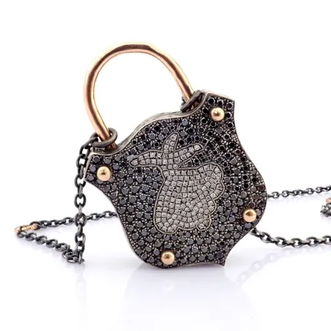 An Exquisite, Convertible Clasp Necklace Embellished With Gold and Diamonds On Silver