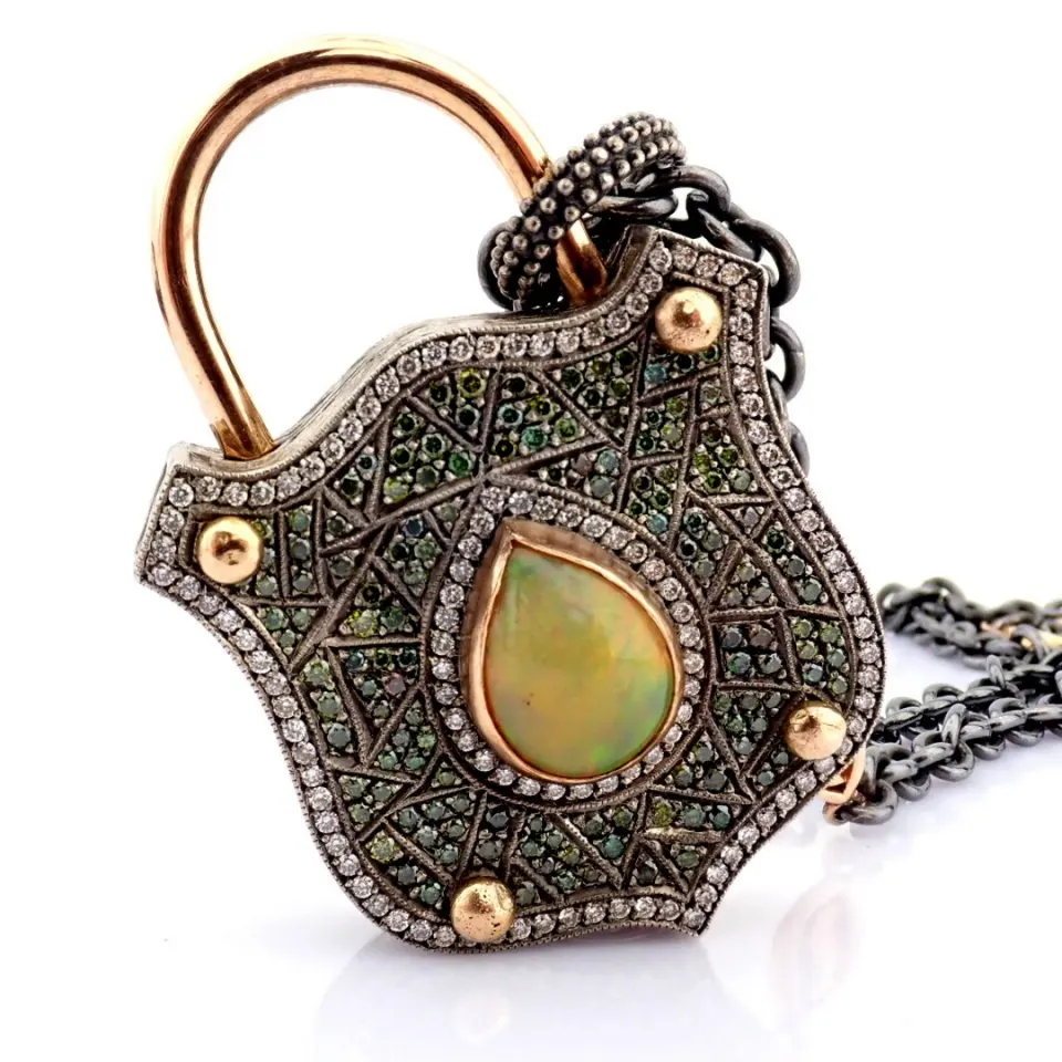 Convertible clasp necklace embellished with gold, colorful stones, and diamonds on silver