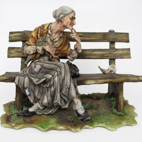 Capodimonte Lady Tramp on Bench