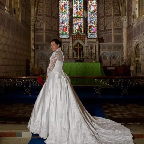 Alfred Angelo "Catherine" size 12 approx.  Ivory