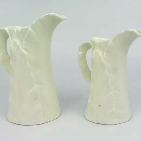 Pair of Royal Worcester Leaf Jugs