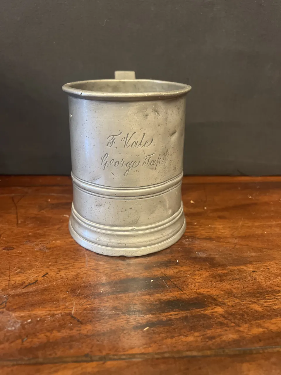 Pewter mug with name and pub inscription