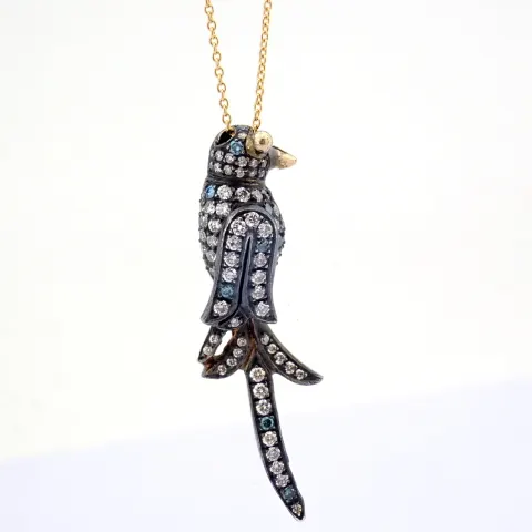 An Exquisite Bird Necklace Detailed With Brilliant Diamonds and Gold On Silver.