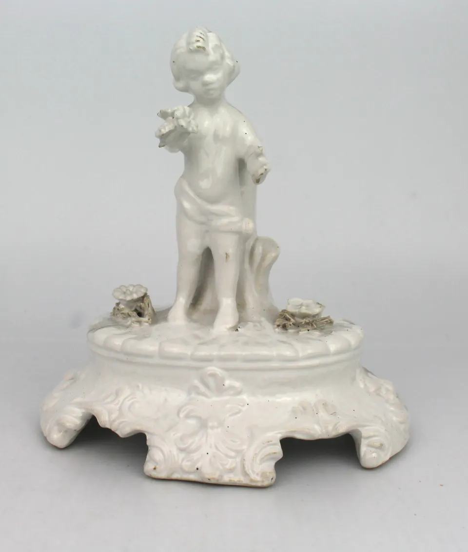 Painted White Porcelain Cherub Figurine