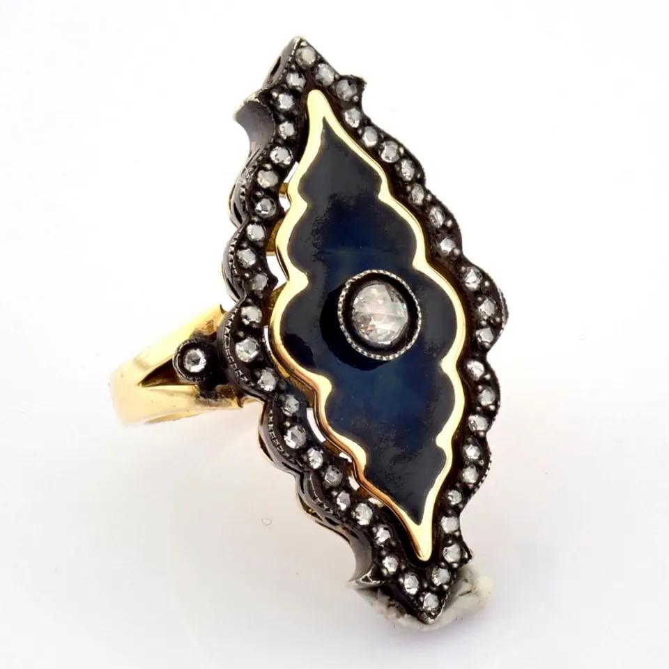 An Exquisite Ring Detailed With Black Enamel, Brilliant Diamonds and Gold On Silver.