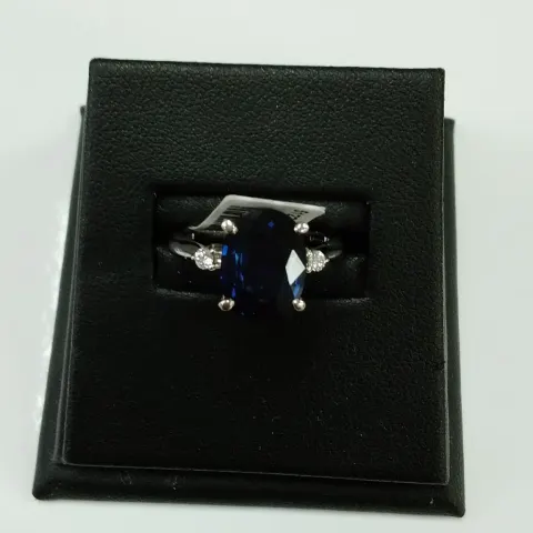Platinum Oval Cut Sapphire And Diamond Ring (S3.63) 0.08 Carats