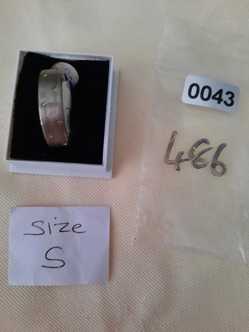 Sterling silver 6 mm wedding band.  RRP £89.  Size S