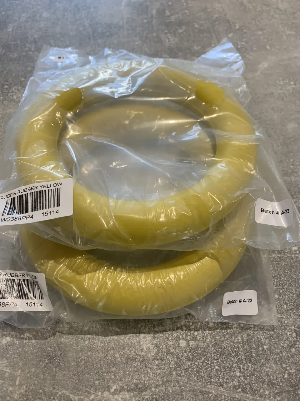 Brand New Quoits Rubber Yellow Dog Chew x 2