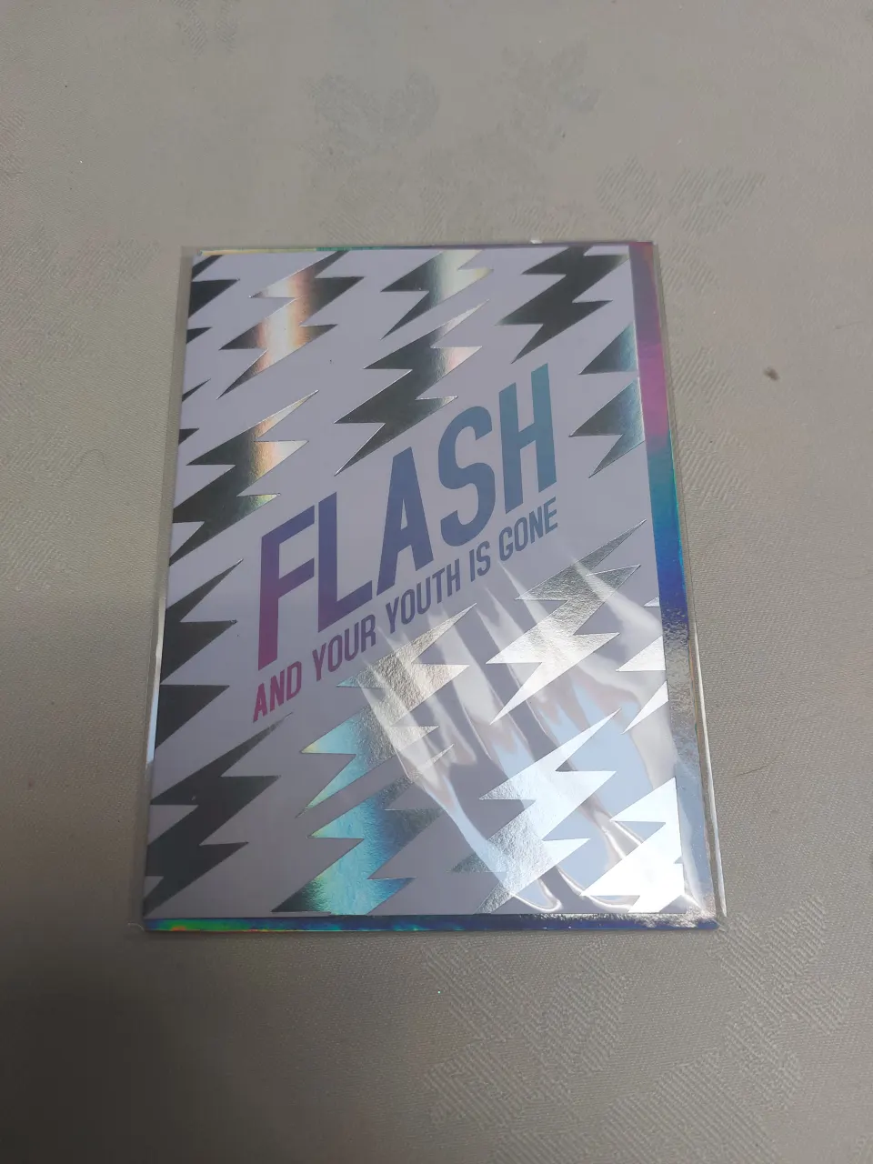 Greetings cards.   Flash and your youth is gone.  RRP £120
