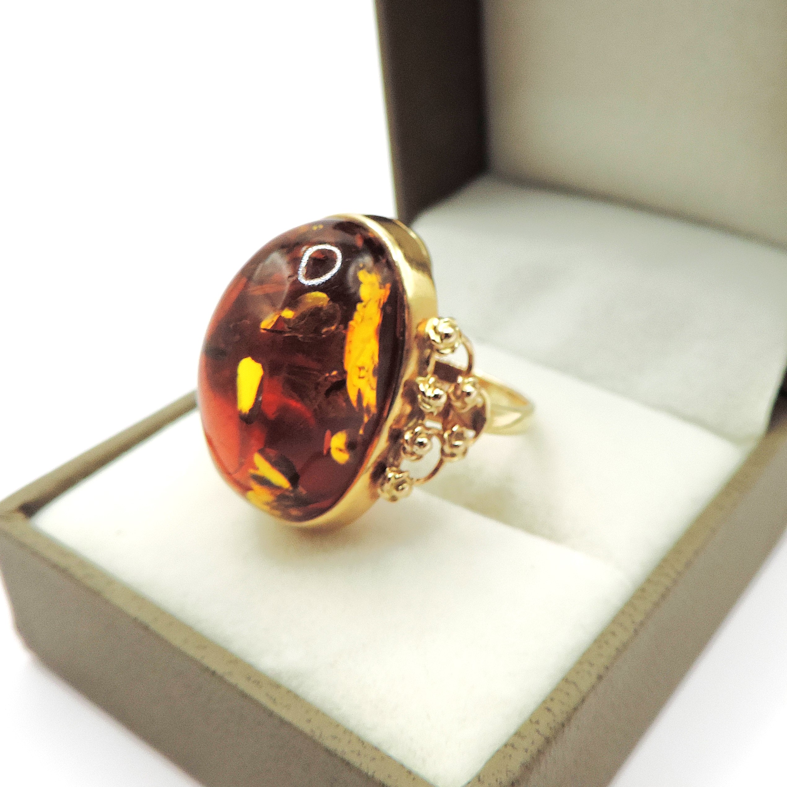 Artisan 14k Gold 23x12mm Cabochon Baltic Amber Ring circa. 1990's.