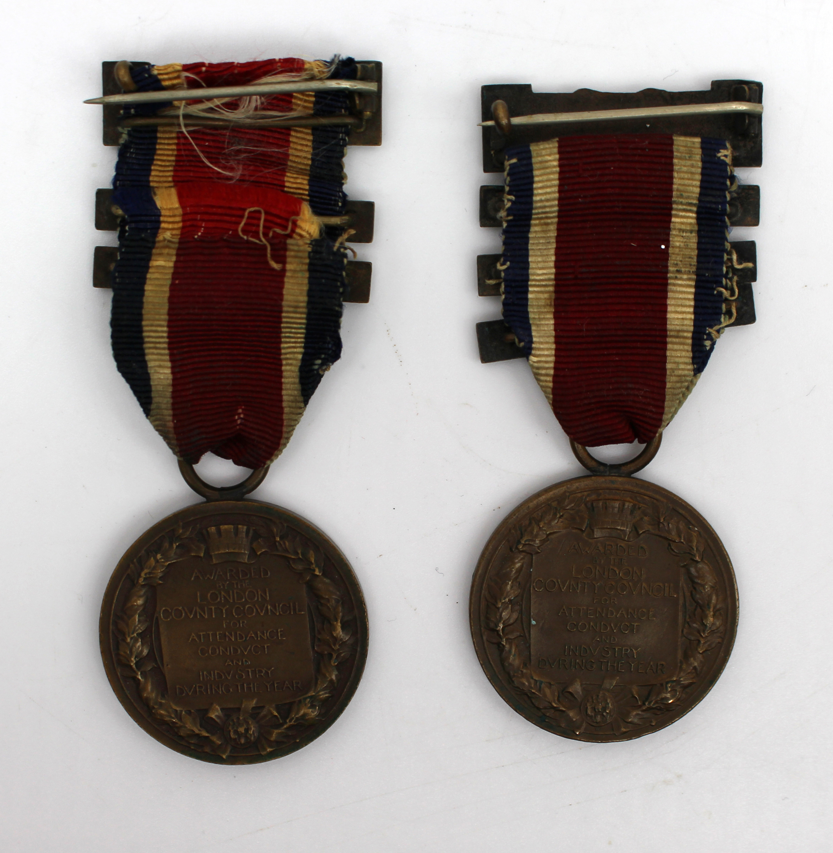 Pair of L.C.C. King’s Medals for Attendance, Conduct & Industry