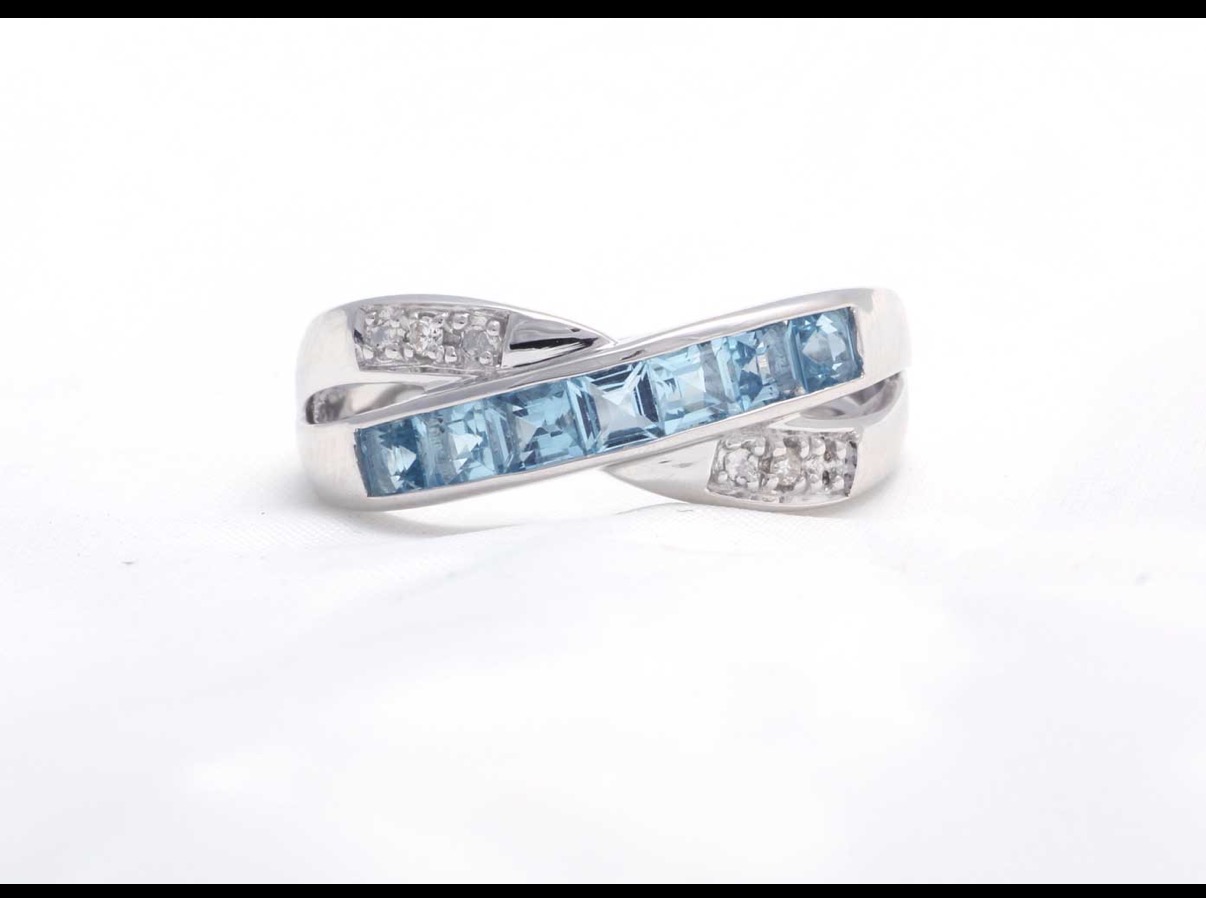 9Ct White Gold Blue Topaz and Diamond Ring (BT1.50) 0.02 Carats