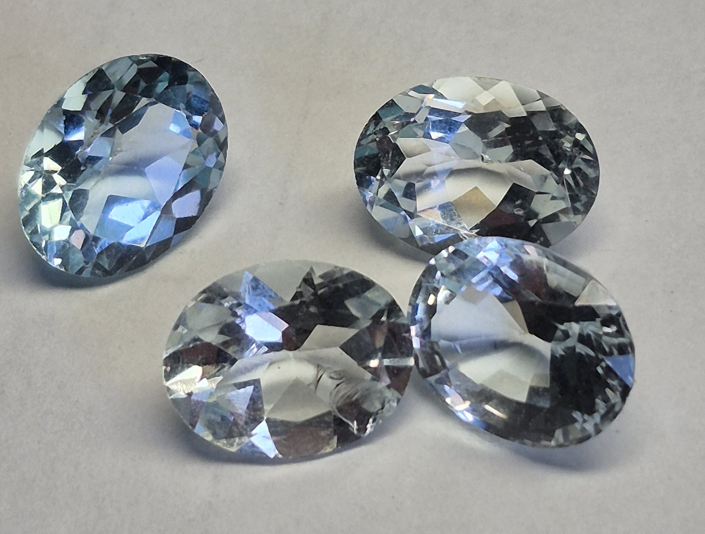 Natural Sky Blue Topaz Parcel 7.10 ct – 4 Matching Oval Cut Gemstones 9x7 mm