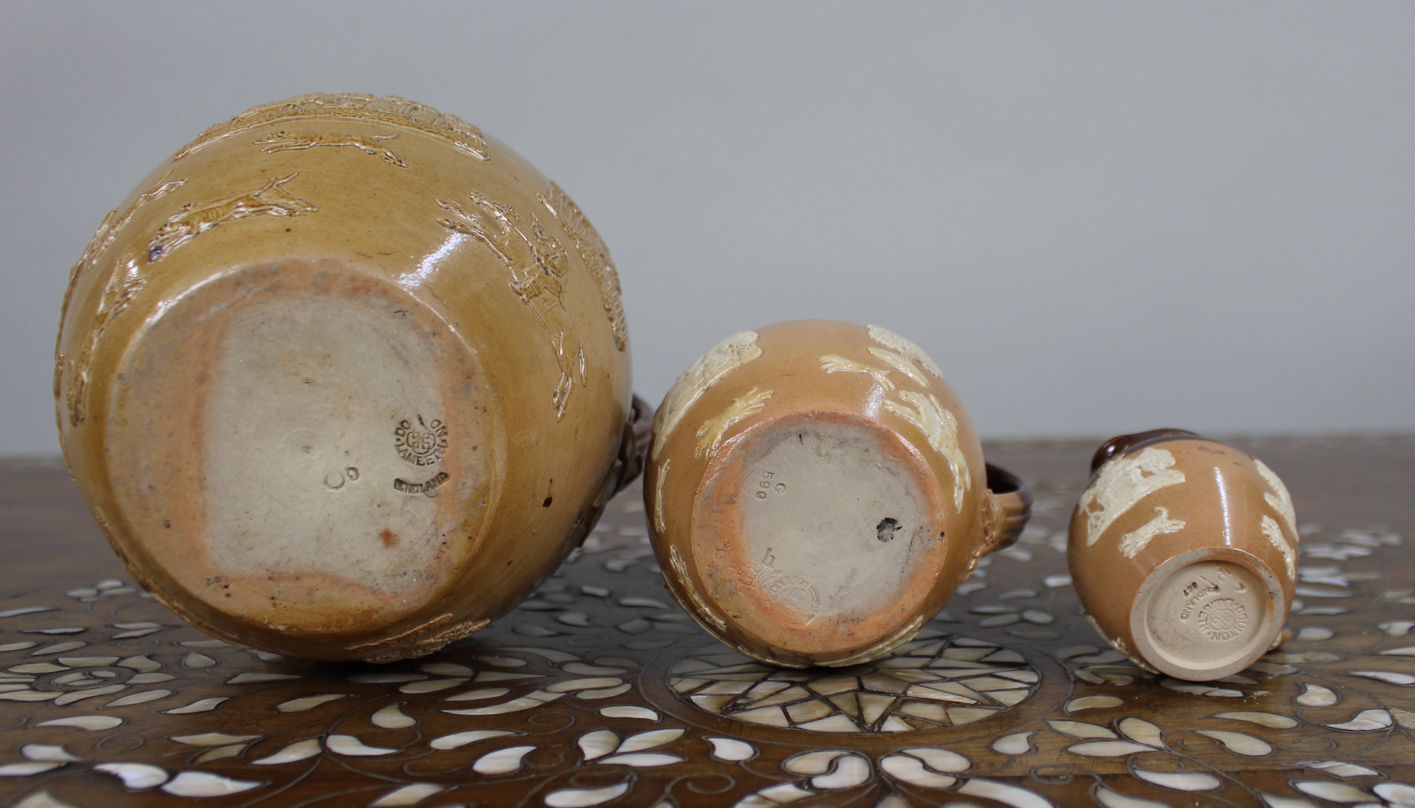 Collection of Three Graduated Doulton Lambeth Stoneware Jugs, c.1900