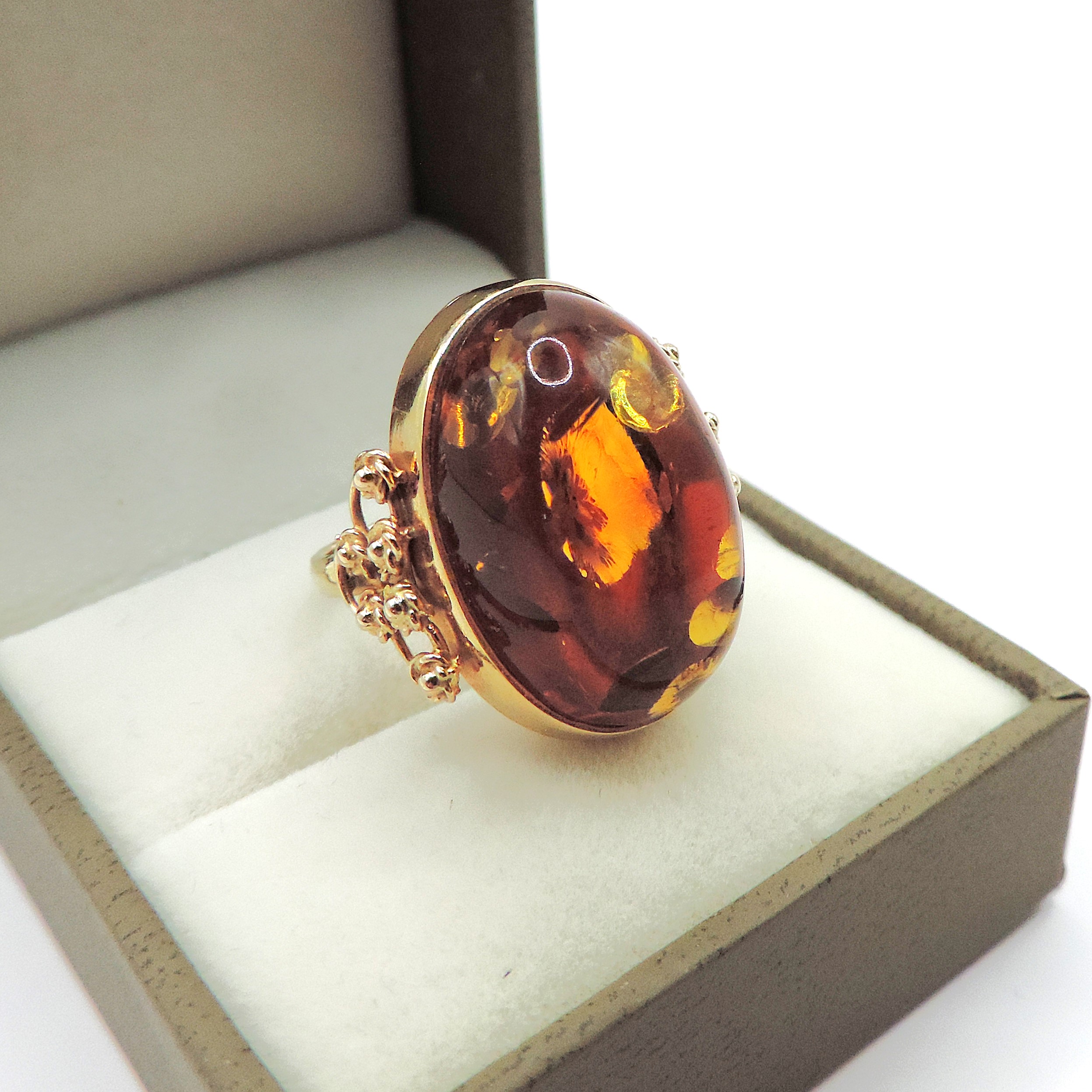 Artisan 14k Gold 23x12mm Cabochon Baltic Amber Ring circa. 1990's.