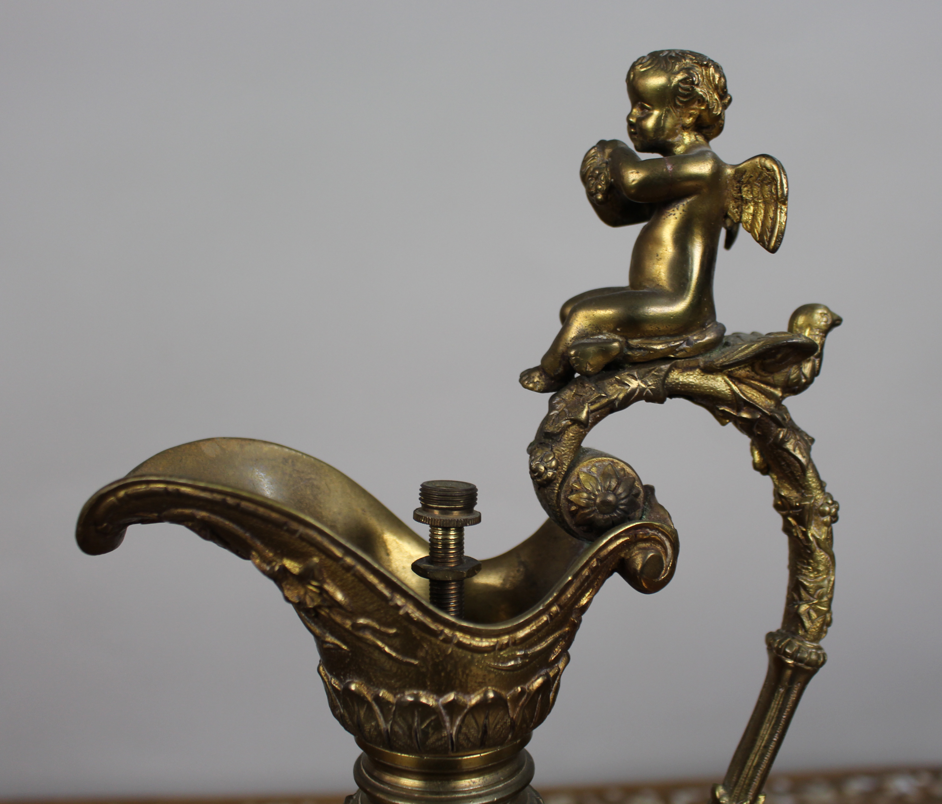 Pair of 19th Century French Gilt Bronze Bacchanalian Ewers with Cherubs
