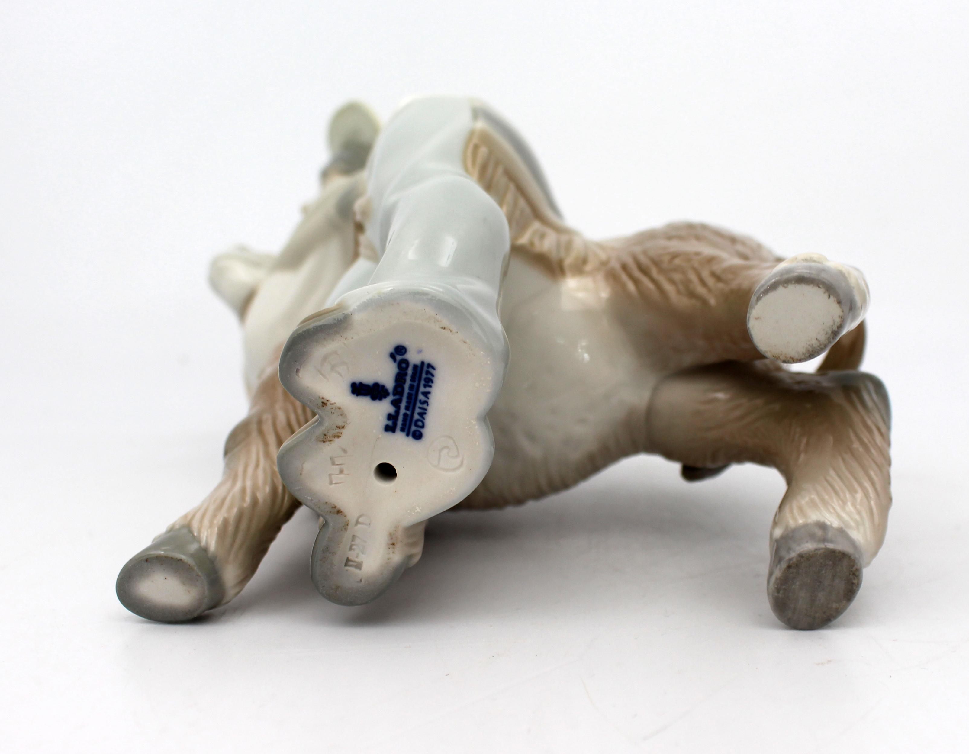 Lladro Boy Hugging Donkey