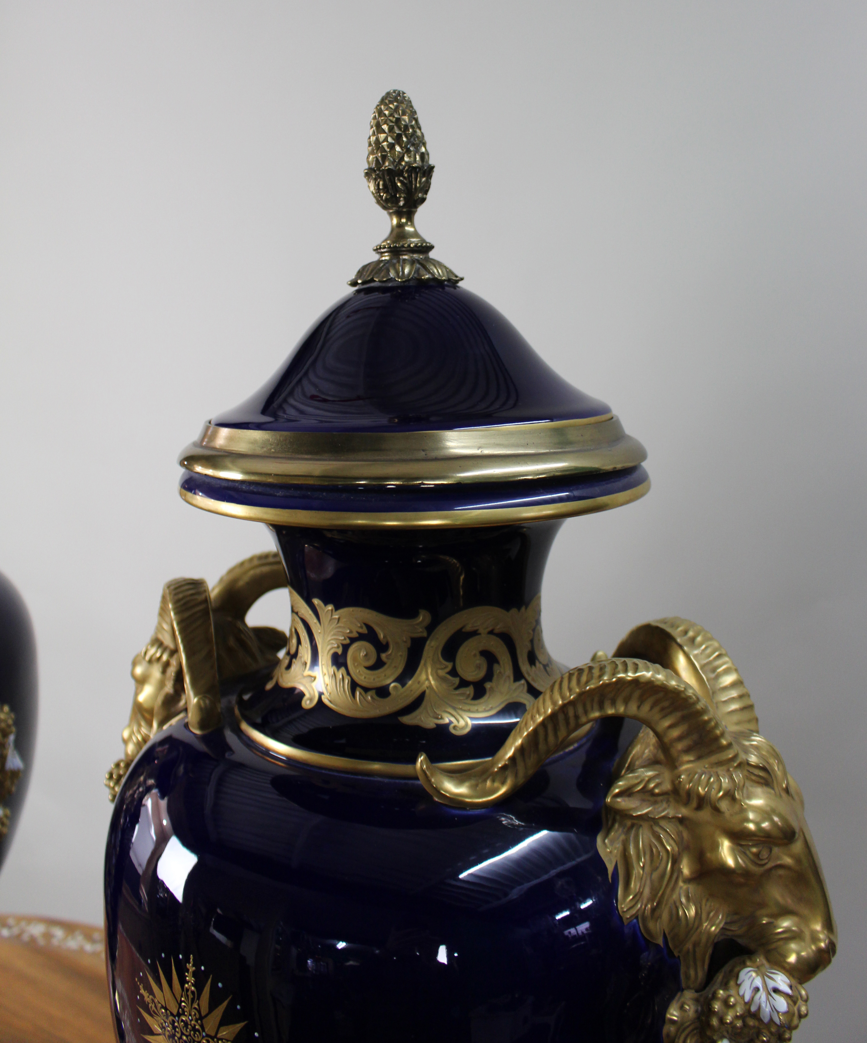 Pair of Fine Sevres Style Cobalt Blue Rams Head Lidded Urns
