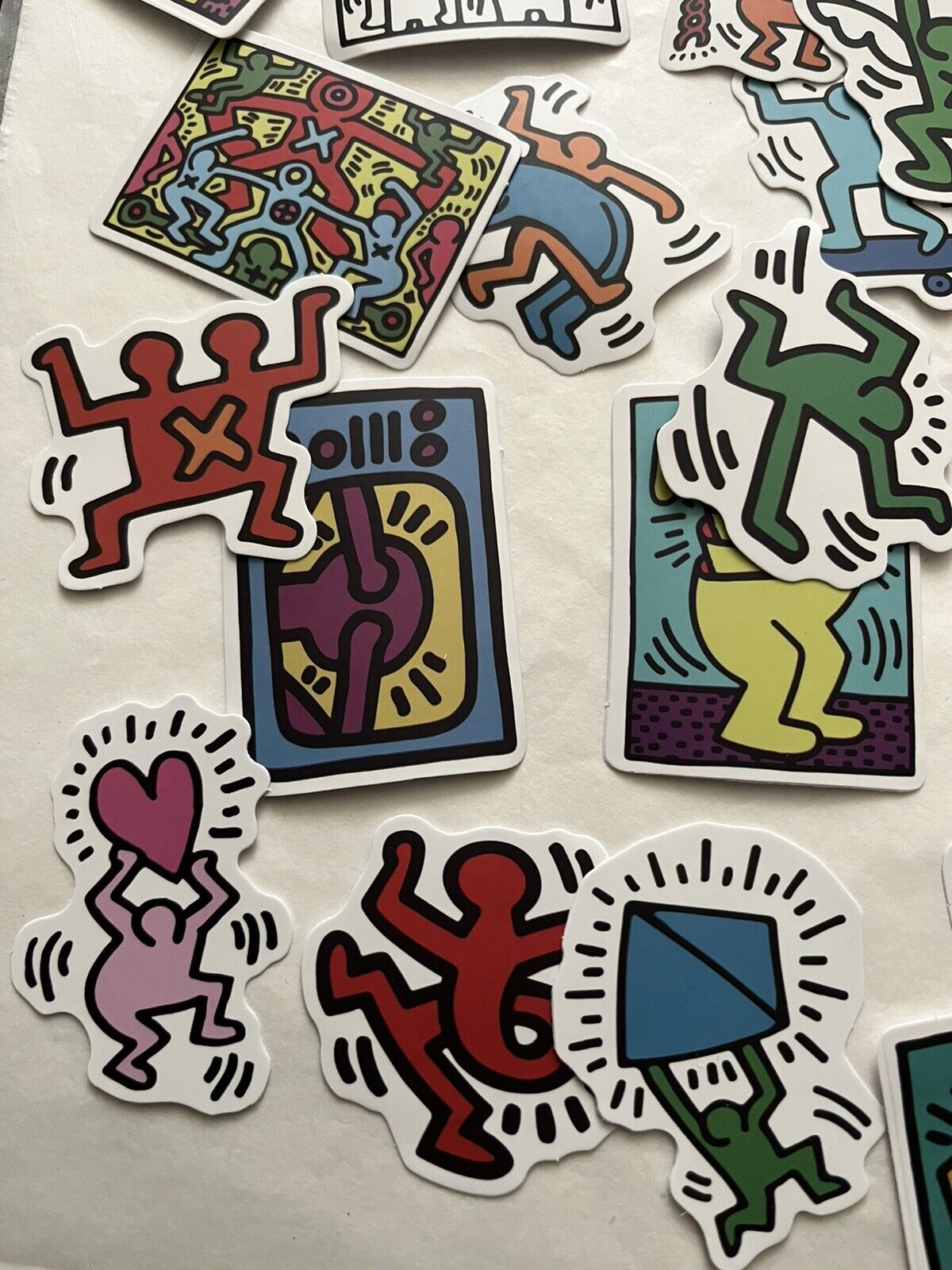 Keith Haring (1958-1990) 25 Piece Sticker Set, AV Size 5 x 5 cm Inc Family Hug, Disco Dino, 2020