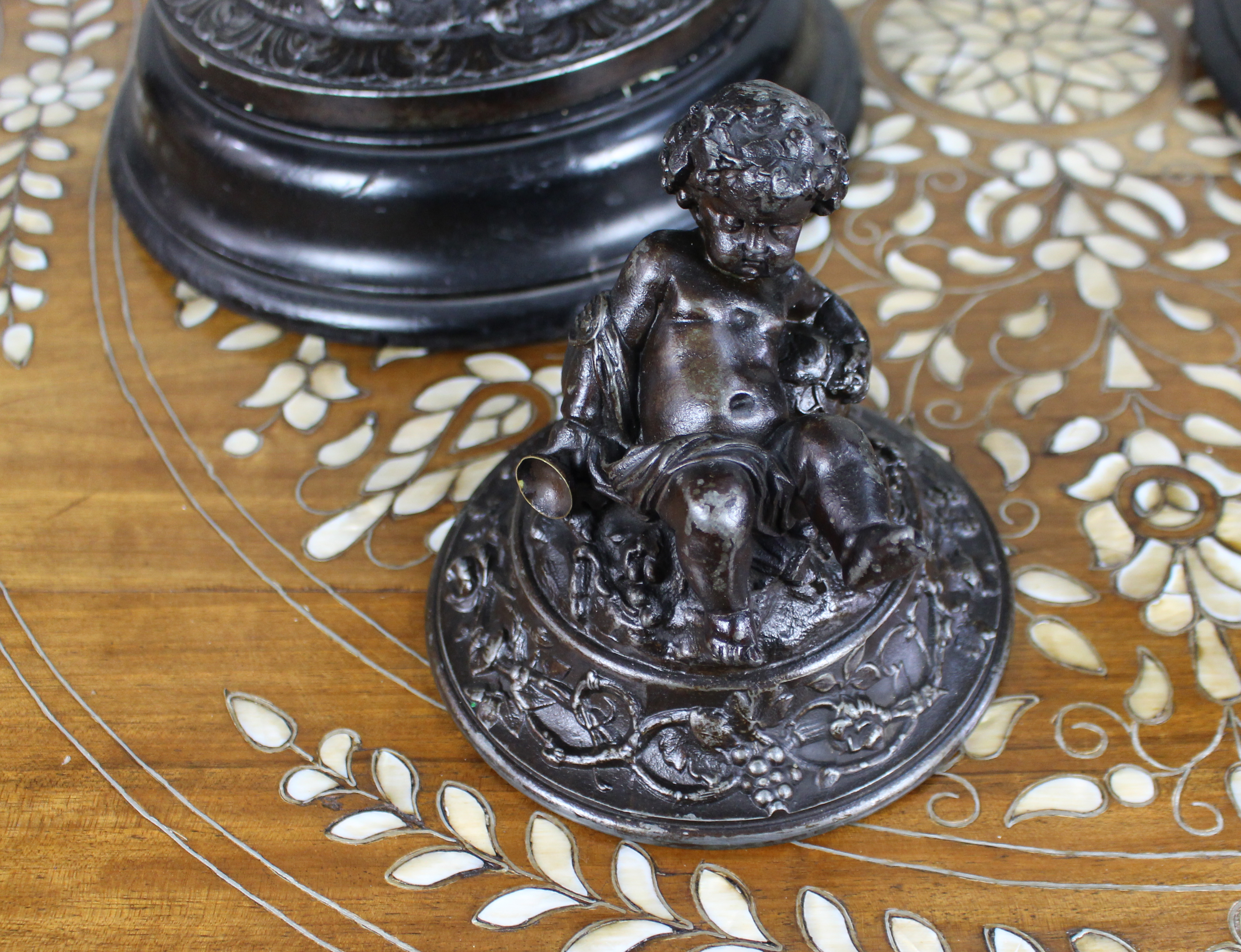 Pair of French Bronzed Spelter Urns with Bacchic Masks and Putti, Circa 1880