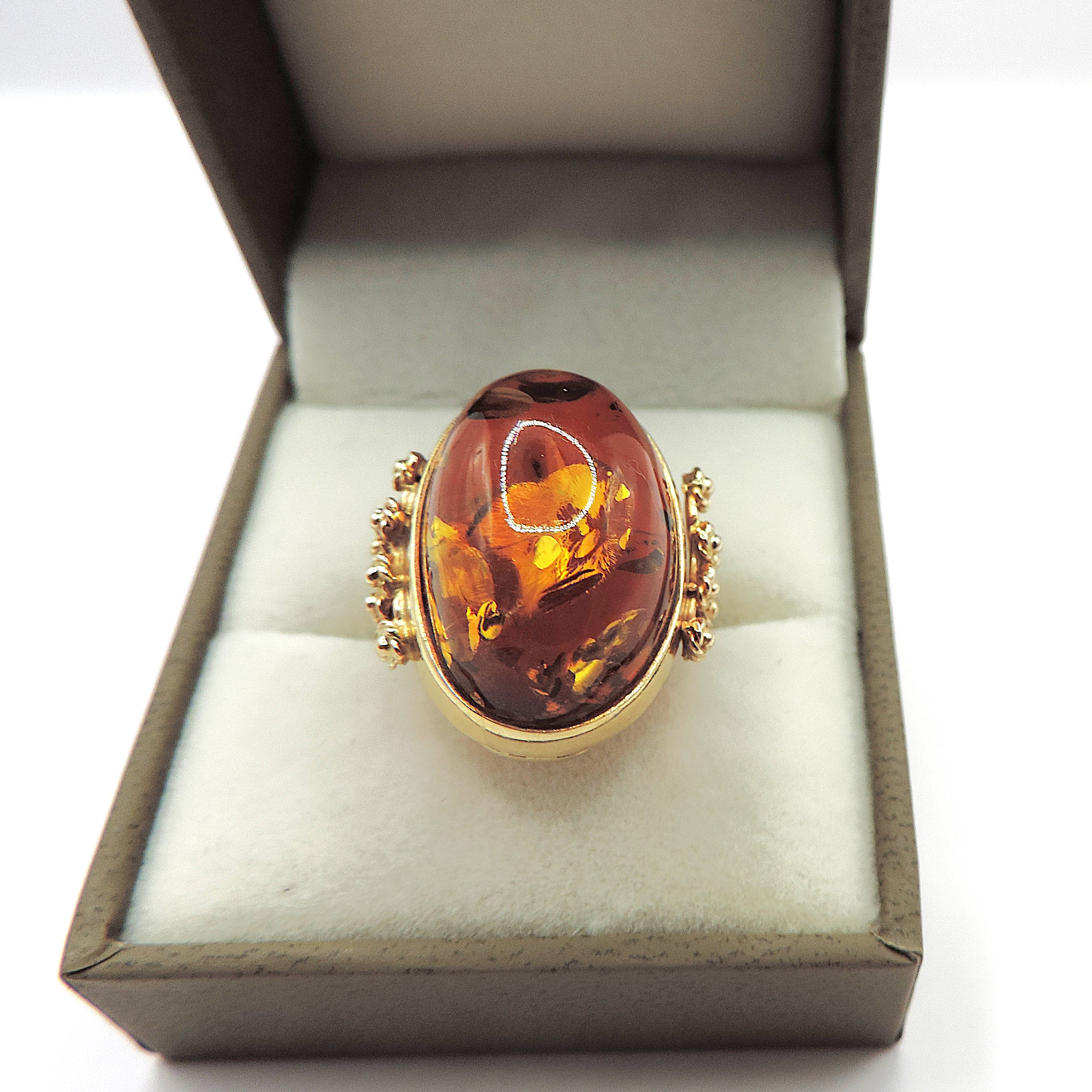 Artisan 14k Gold 23x12mm Cabochon Baltic Amber Ring circa. 1990's.