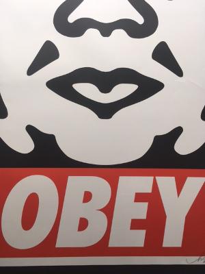 Shepard Fairey (b.1970) OBEY ‘Giant Face’ in colours, signed in pencil l.r. 96.5 x 63.5cm