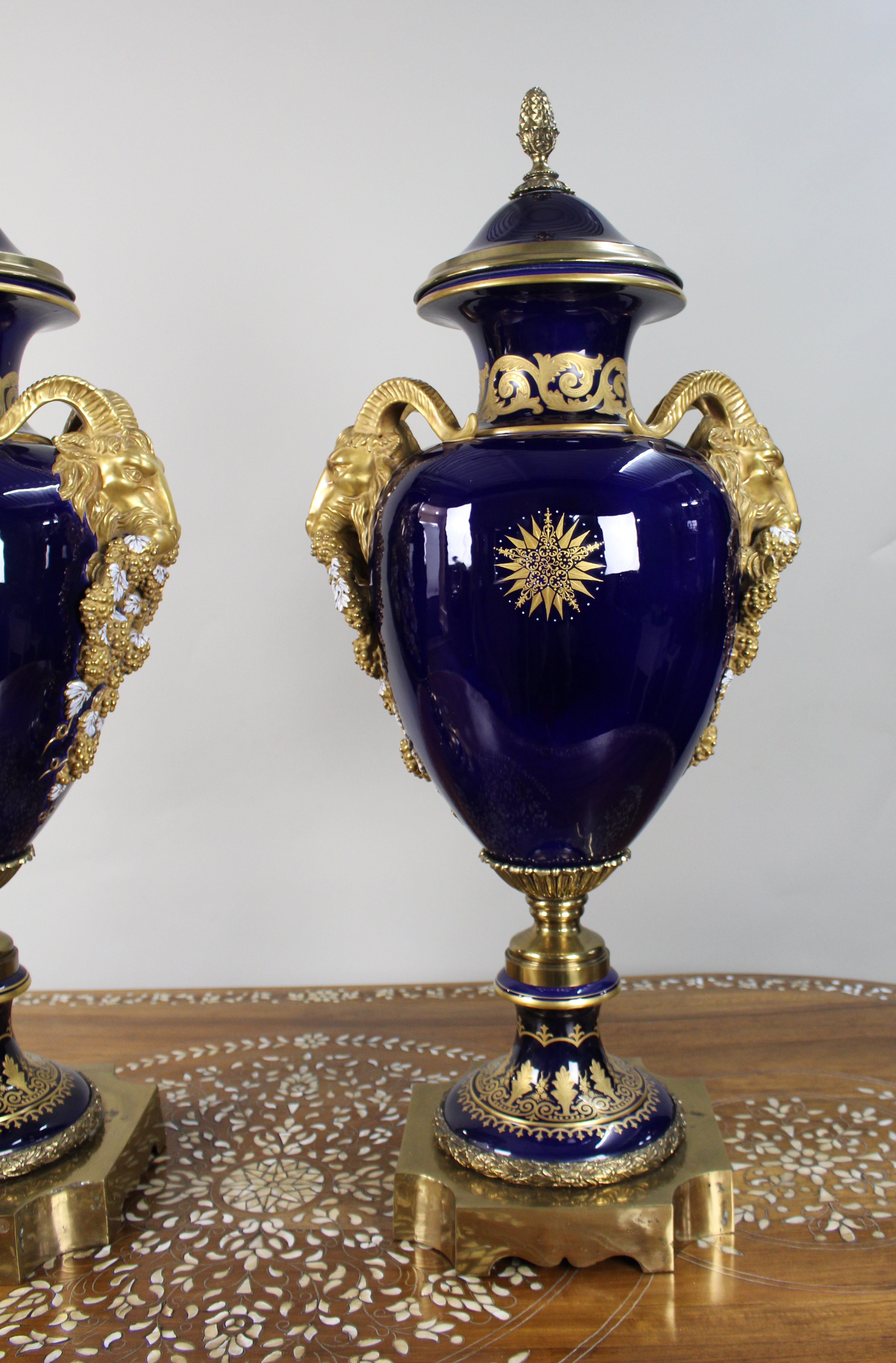 Pair of Fine Sevres Style Cobalt Blue Rams Head Lidded Urns