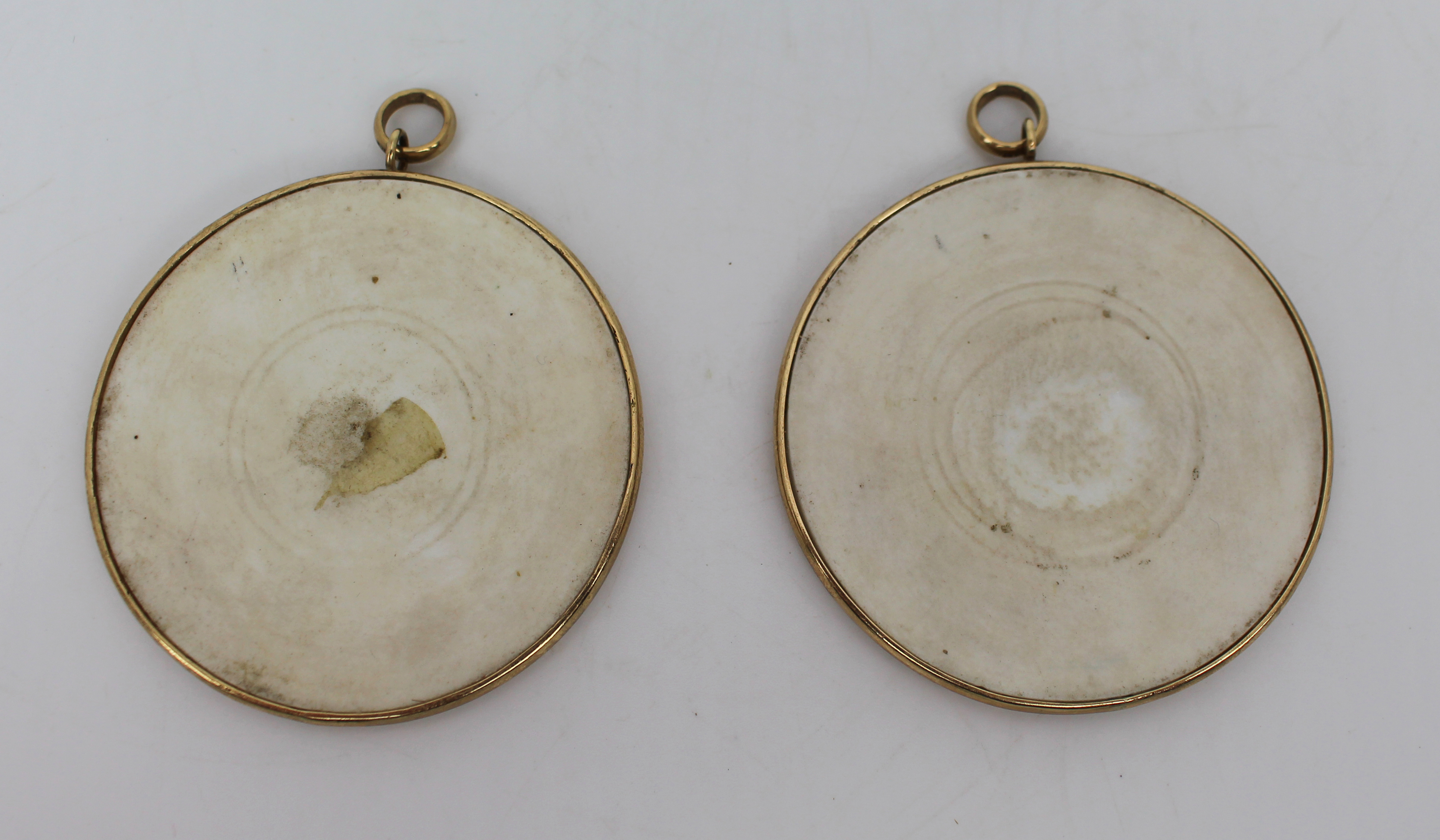 Pair of Antique Hand Painted Porcelain Plaques in 9ct Gold Surrounds